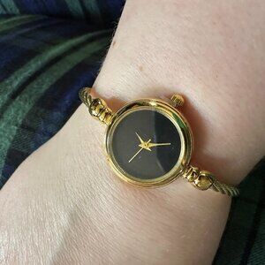 gold tone round bracelet watch